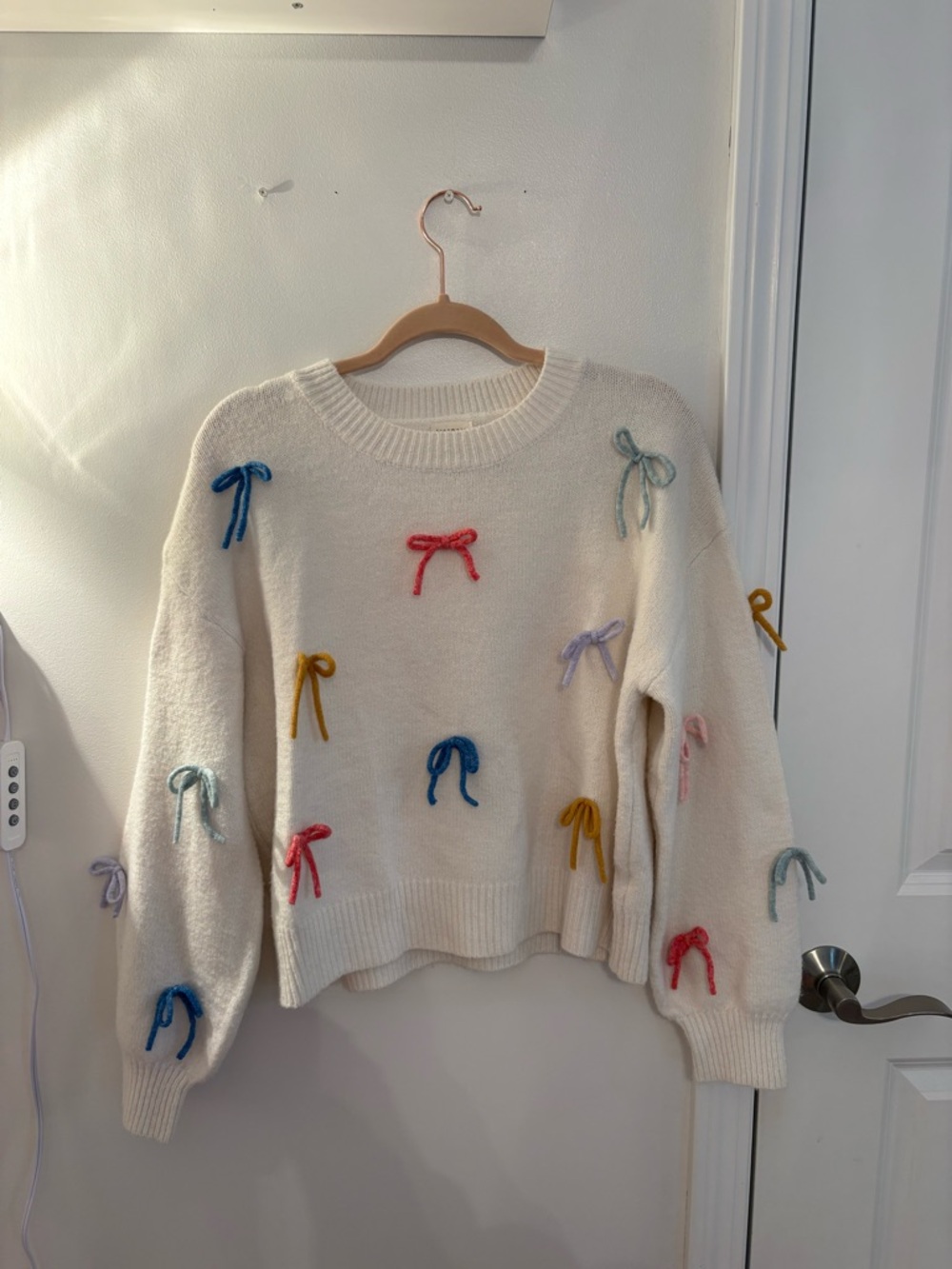 Dry Goods Cream Crewneck Sweater with Multicolored Bow Accents